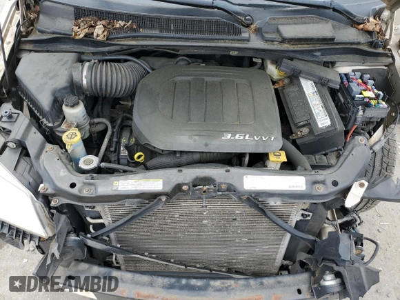 2012 Chrysler Town & Country Touring with VIN 2C4RC1BG9CR277979, listed as a Copart auction lot 55486265 with 114,851 mi miles and Salvage Title. Bid and sale history available at DreamBid. Image 12.