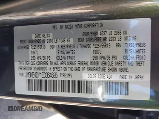 2014 Mazda CX-5 Grand Touring with VIN JM3KE4DY1E0364685, listed as a IAAI auction lot 41665349 with 135,751 mi miles. Bid and sale history available at carsss.com. Image 9.