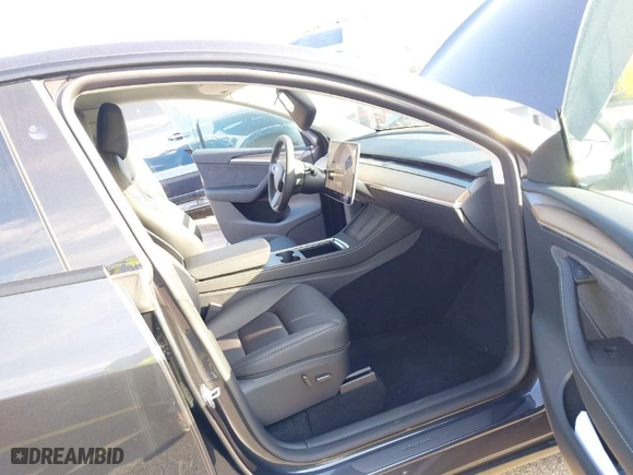 2024 Tesla Model Y with VIN 7SAYGDED4RF097142, listed as a IAAI auction lot 41484729 with 20 mi miles. Bid and sale history available at carsss.com. Image 5.