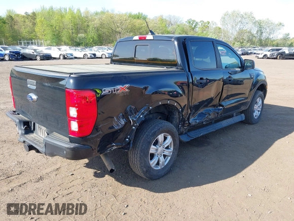 2021 Ford Ranger XL with VIN 1FTER4FHXMLD50868, listed as a IAAI auction lot 42128556 with 99,164 mi miles and . Bid and sale history available at DreamBid. Image 4.