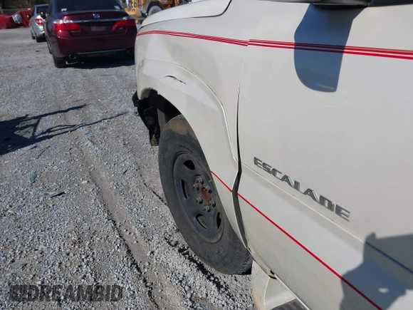 2004 Cadillac Escalade с VIN 1GYEC63TX4R299594, выставлен на аукционе IAAI как лот 41833184 с пробегом 320 822 миль миль и . История ставок и продаж доступна на DreamBid. Изображение 11.