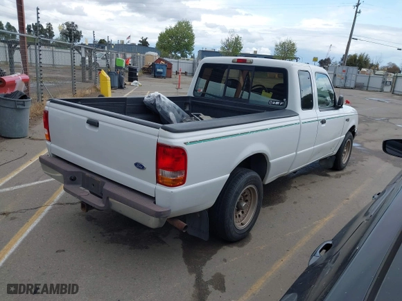 1997 Ford Ranger Splash with VIN 1FTCR14U2VPB53919, listed as a IAAI auction lot 41938679 with 255,738 mi miles. Bid and sale history available at carsss.com. Image 4.