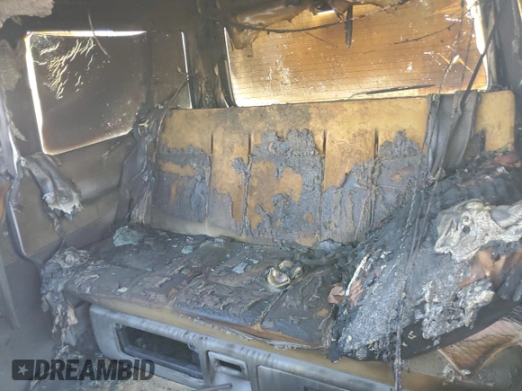 2001 Volkswagen EuroVan MV с VIN WV2NB47061H099148, выставлен на аукционе Copart как лот 77123813 с пробегом Не указан миль и На запчасти • Non repairable. История ставок и продаж доступна на DreamBid. Изображение 10.