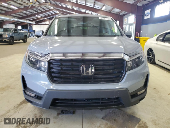 2023 Honda Ridgeline RTL-E with VIN 5FPYK3F77PB001460, listed as a Copart auction lot 61383785 with 27,423 mi miles and Salvage title. Bid and sale history available at DreamBid. Image 5.