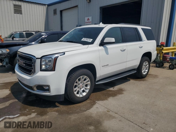 2020 GMC Yukon SLT with VIN 1GKS1BKC0LR243224, listed as a Copart auction lot 65768234 with 129,702 mi miles and Salvage Title. Bid and sale history available at DreamBid. Image 1.