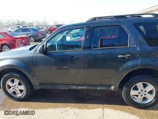 2009 Ford Escape XLT with VIN 1FMCU03709KB87490, listed as a IAAI auction lot 41989526 with 186,207 mi miles. Bid and sale history available at carsss.com. Image 14.