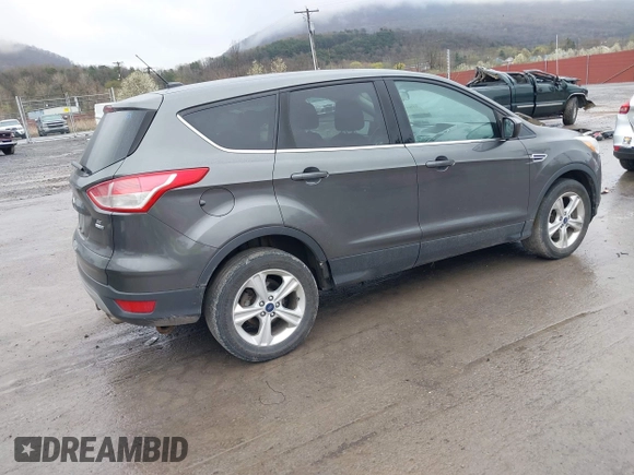 2015 Ford Escape SE with VIN 1FMCU9GX6FUC73272, listed as a IAAI auction lot 41966307 with 118,144 mi miles and . Bid and sale history available at DreamBid. Image 4.