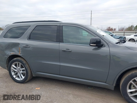 2023 Dodge Durango GT Plus with VIN 1C4RDHDG3PC601932, listed as a IAAI auction lot 41238697 with 56,294 mi miles and . Bid and sale history available at DreamBid. Image 13.