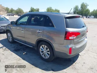 2014 Kia Sorento EX with VIN 5XYKU4A74EG498074, listed as a IAAI auction lot 42136870 with 128,142 mi miles. Bid and sale history available at carsss.com. Image 3.