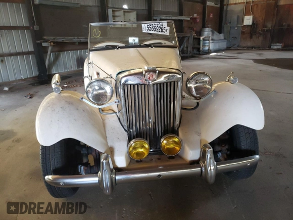 1971 Volkswagen Beetle with VIN 1112313102, listed as a Copart auction lot 55659265 with 3,677 mi miles and Salvage Title. Bid and sale history available at DreamBid. Image 5.