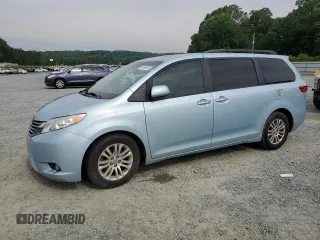 2015 Toyota Sienna XLE with VIN 5TDYK3DC1FS622213, listed as a Copart auction lot 58990465 with 202,750 mi miles and Salvage title. Bid and sale history available at DreamBid. Image 1.