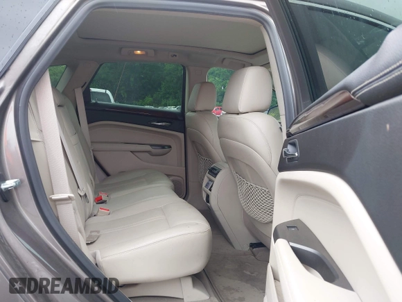 2012 Cadillac SRX Premium Collection z VIN 3GYFNCE3XCS620507, wystawiony jako IAAI lot #42348835 z przebiegiem 184 737 mil mil oraz . Historia ofert i sprzedaży dostępna na DreamBid. Obrazek 8.