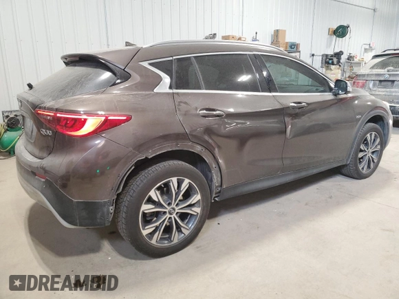 2017 Infiniti QX30 Premium with VIN SJKCH5CR9HA017539, listed as a Copart auction lot 84092934 with 89,019 mi miles and Salvage title. Bid and sale history available at DreamBid. Image 3.
