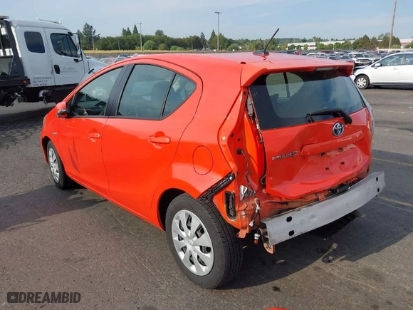 2014 Toyota Prius c One with VIN JTDKDTB32E1065438, listed as a IAAI auction lot 37350203 with 94,630 mi miles. Bid and sale history available at carsss.com. Image 3.