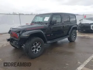 2021 Jeep Wrangler Unlimited Rubicon with VIN 1C4HJXFG8MW775419, listed as a IAAI auction lot 41797178 with 56,166 mi miles. Bid and sale history available at carsss.com. Image 18.