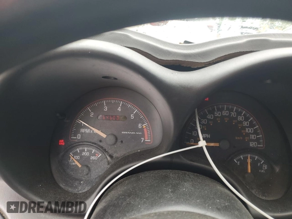 2002 Pontiac Grand Am SE z VIN 1G2NE52F92C172605, wystawiony jako Copart lot #56541555 z przebiegiem 164 600 mil mil oraz Szkoda całkowita • Salvage title. Historia ofert i sprzedaży dostępna na DreamBid. Obrazek 9.