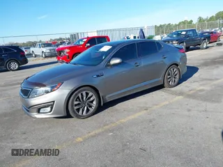 2015 Kia Optima SX Turbo with VIN 5XXGR4A66FG382167, listed as a IAAI auction lot 40951399 with 77,083 mi miles and . Bid and sale history available at DreamBid. Image 2.
