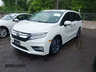 2018 Honda Odyssey Elite z VIN 5FNRL6H94JB008108, wystawiony jako IAAI lot #42126779 z przebiegiem 93 859 mil mil oraz . Historia ofert i sprzedaży dostępna na DreamBid. Obrazek 2.