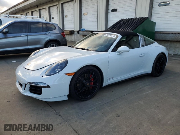2016 Porsche 911 4S with VIN WP0BB2A93GS136097, listed as a Copart auction lot 76078574 with 14,208 mi miles and Salvage Title. Bid and sale history available at DreamBid. Image 1.