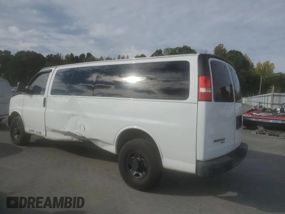 2014 Chevrolet Express Passenger 1LS with VIN 1GAZGZFAXE1105162, listed as a Copart auction lot 72773154 with 97,950 mi miles and Salvage title. Bid and sale history available at DreamBid. Image 2.