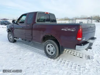 2000 Ford F-150 XL with VIN 1FTRX18L2YNA50128, listed as a IAAI auction lot 40956879 with 1 mi miles. Bid and sale history available at carsss.com. Image 3.