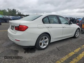 2015 BMW 3 Series 328i xDrive with VIN WBA3B5C55FF959442, listed as a Copart auction lot 57566895 with 97,628 mi miles and Clean title. Bid and sale history available at DreamBid. Image 3.