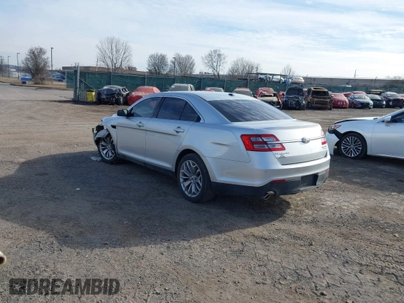 2014 Ford Taurus Limited with VIN 1FAHP2F86EG134779, listed as a IAAI auction lot 41660527 with 115,016 mi miles. Bid and sale history available at carsss.com. Image 3.