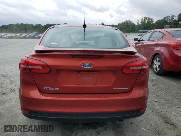 2018 Ford Focus Titanium with VIN 1FADP3J26JL284299, listed as a Copart auction lot 58908325 with 79,331 mi miles and Salvage title. Bid and sale history available at DreamBid. Image 6.