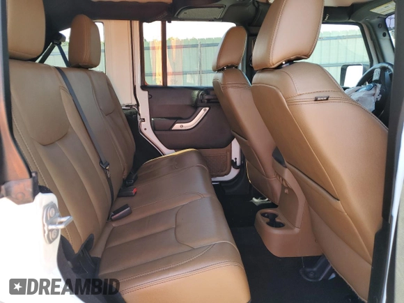 2018 Jeep Wrangler JK Unlimited Sahara with VIN 1C4HJWEG7JL910656, listed as a Copart auction lot 73414244 with 50,519 mi miles and Salvage Title. Bid and sale history available at carsss.com. Image 11.