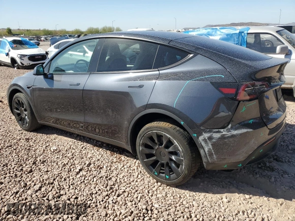 2024 Tesla Model Y Long Range with VIN 7SAYGDEE9RA221380, listed as a Copart auction lot 47516705 with 10,930 mi miles and Salvage Title. Bid and sale history available at DreamBid. Image 2.
