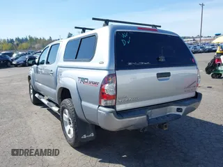 2014 Toyota Tacoma with VIN 3TMLU4EN7EM146705, listed as a IAAI auction lot 41949827 with 147,887 mi miles and . Bid and sale history available at DreamBid. Image 3.