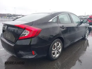 2018 Honda Civic LX with VIN 2HGFC2F54JH548274, listed as a IAAI auction lot 41864457 with 60,905 mi miles and . Bid and sale history available at DreamBid. Image 4.