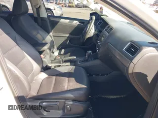 2013 Volkswagen Jetta TDI w/Premium/Nav with VIN 3VWLL7AJXDM392313, listed as a IAAI auction lot 42370151 with 98,618 mi miles and . Bid and sale history available at DreamBid. Image 5.