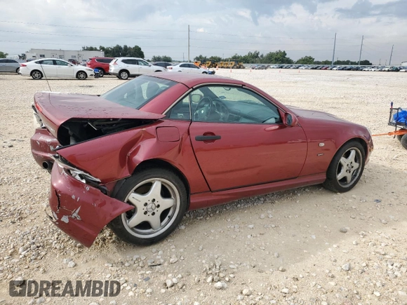 1999 Mercedes-Benz SLK-Class with VIN WDBKK47F0XF132802, listed as a Copart auction lot 69818544 with 123,026 mi miles and Salvage Title. Bid and sale history available at carsss.com. Image 3.
