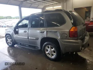 2005 GMC Envoy SLT z VIN 1GKDS13S152270398, wystawiony jako Copart lot #56160625 z przebiegiem 123 260 mil mil oraz Szkoda całkowita • Salvage title. Historia ofert i sprzedaży dostępna na DreamBid. Obrazek 2.