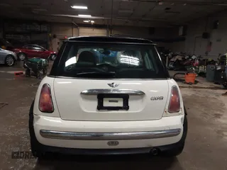 2004 MINI Hardtop with VIN WMWRC33404TC48963, listed as a IAAI auction lot 41661909 with 182,532 mi miles and . Bid and sale history available at DreamBid. Image 16.