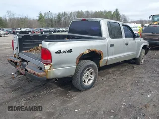 2004 Dodge Dakota Sport with VIN 1D7HG38K54S634958, listed as a IAAI auction lot 41831018 with 135,917 mi miles. Bid and sale history available at carsss.com. Image 4.