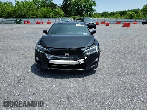 2014 Scion FR-S z VIN JF1ZNAA16E8702957, wystawiony jako Copart lot #58801915 z przebiegiem 114 656 mil mil oraz Szkoda całkowita • Salvage title. Historia ofert i sprzedaży dostępna na DreamBid. Obrazek 13.