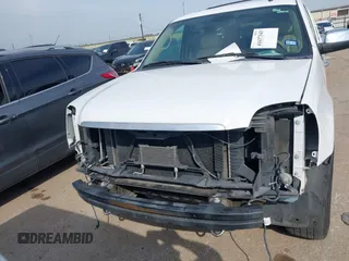 2011 GMC Yukon SLT with VIN 1GKS1CE03BR347941, listed as a IAAI auction lot 41637343 with 198,830 mi miles. Bid and sale history available at carsss.com. Image 13.
