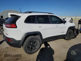 2018 Jeep Cherokee Trailhawk with VIN 1C4PJMBB1JD549783, listed as a Copart auction lot 77056883 with 84,404 mi miles and Non repairable. Bid and sale history available at DreamBid. Image 3.