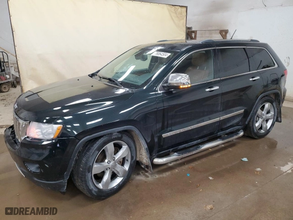 2013 Jeep Grand Cherokee Overland Summit with VIN 1C4RJFCT1DC525456, listed as a Copart auction lot 79064504 with 199,641 mi miles and Clean Title. Bid and sale history available at carsss.com. Image 1.