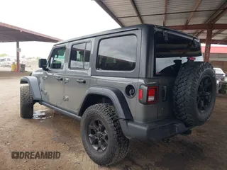 2020 Jeep Wrangler Unlimited Black and Tan с VIN 1C4HJXDG3LW266615, выставлен на аукционе IAAI как лот 42207899 с пробегом 55 291 миль миль и . История ставок и продаж доступна на DreamBid. Изображение 3.
