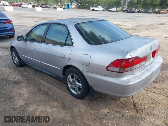 2002 Honda Accord SE z VIN JHMCG66802C027742, wystawiony jako IAAI lot #42373110 z przebiegiem 141 167 mil mil oraz . Historia ofert i sprzedaży dostępna na DreamBid. Obrazek 3.