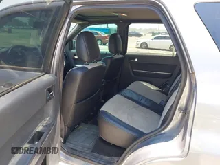 2008 Mercury Mariner Premier with VIN 4M2CU87118KJ08023, listed as a IAAI auction lot 42545623 with 161,639 mi miles and . Bid and sale history available at DreamBid. Image 8.