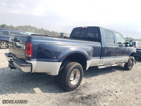 2001 Ford Super Duty F-350 DRW XL with VIN 1FTWW33FX1EB91067, listed as a Copart auction lot 68024904 with 272,132 mi miles and Salvage Title. Bid and sale history available at carsss.com. Image 3.