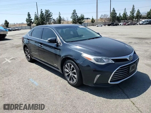 2018 Toyota Avalon Hybrid XLE Plus z VIN 4T1BD1EB6JU063543, wystawiony jako Copart lot #52554915 z przebiegiem 122 986 mil mil oraz Szkoda całkowita • Salvage title. Historia ofert i sprzedaży dostępna na DreamBid. Obrazek 10.