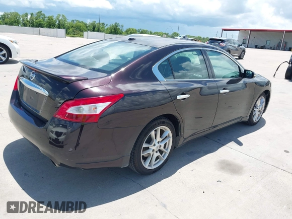 2011 Nissan Maxima SV with VIN 1N4AA5AP5BC855939, listed as a IAAI auction lot 42600437 with 211,716 mi miles and . Bid and sale history available at DreamBid. Image 4.