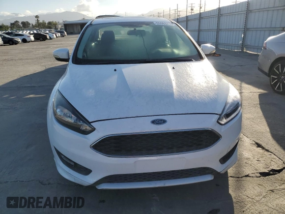 2016 Ford Focus SE with VIN 1FADP3F26GL336032, listed as a Copart auction lot 55963715 with 107,527 mi miles and Clean title. Bid and sale history available at DreamBid. Image 5.