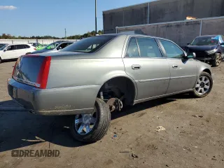 2006 Cadillac DTS 1SC z VIN 1G6KD57Y76U237062, wystawiony jako Copart lot #70920534 z przebiegiem 84 589 mil mil oraz Szkoda całkowita • Salvage title. Historia ofert i sprzedaży dostępna na DreamBid. Obrazek 3.