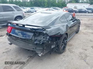 2016 Ford Mustang V6 z VIN 1FA6P8AM8G5251387, wystawiony jako IAAI lot #42231334 z przebiegiem 104 618 mil mil oraz . Historia ofert i sprzedaży dostępna na DreamBid. Obrazek 4.